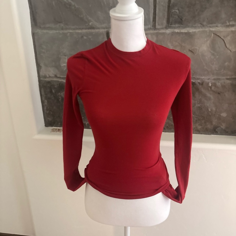 SKIMS Long-Sleeve Cotten Jersey Crewneck Top in Cranberry